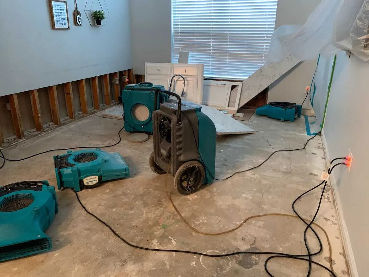 Dehumidifier in flood-cut room for Water Damage Restoration in Brooklyn Park